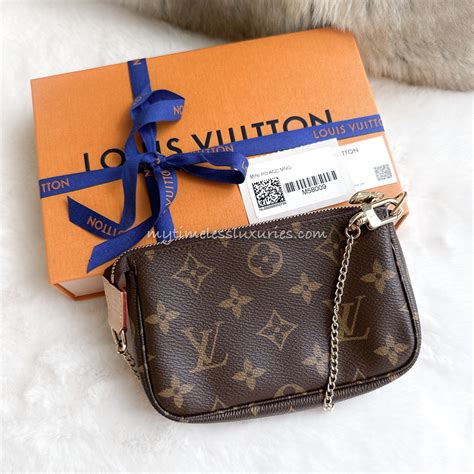 louis vuitton monogram pochette mini|louis vuitton pochette wallet.